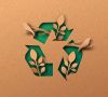 Recyclingsymbol ausgestanzt
